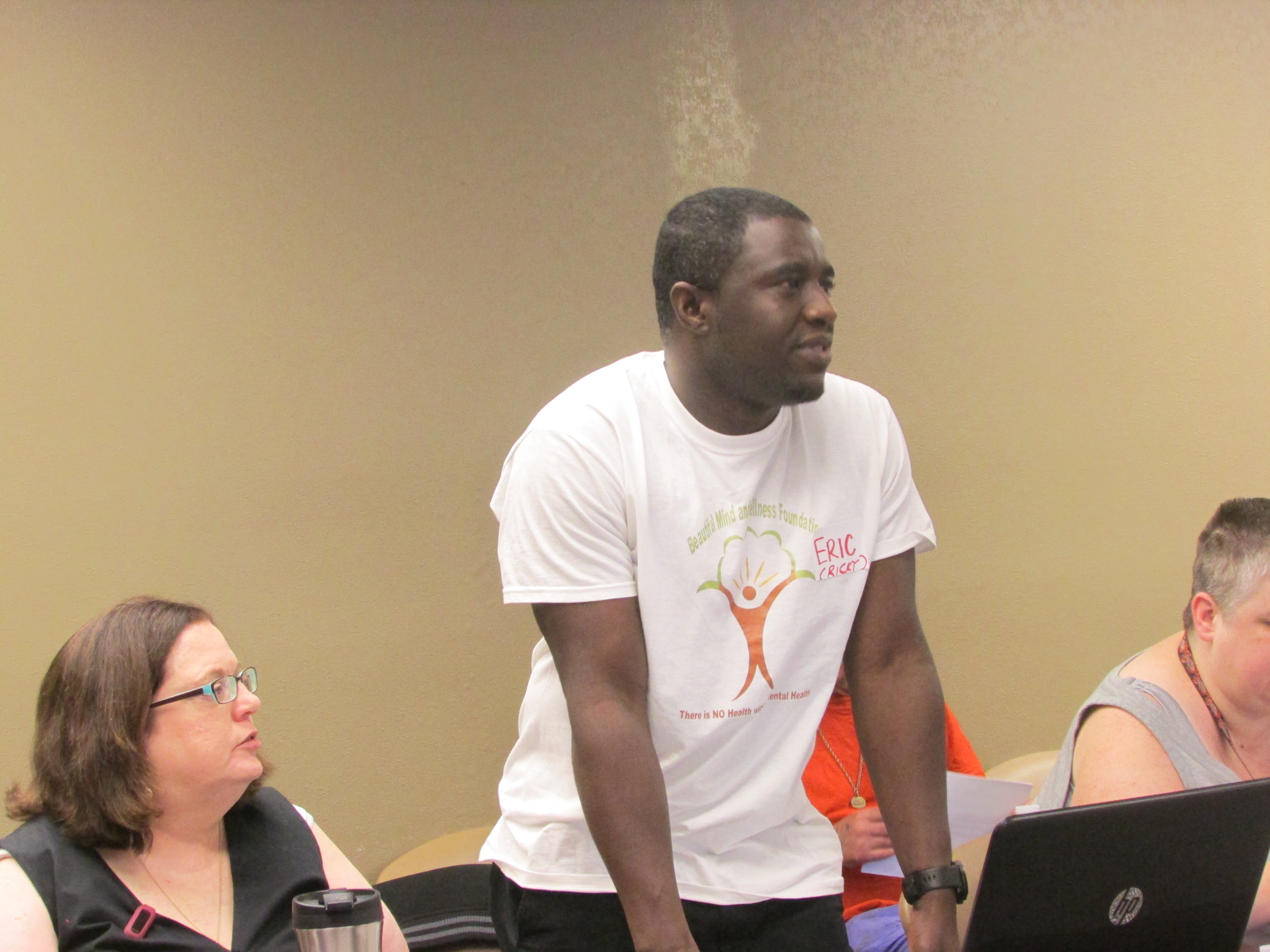 Eric Parbie presenting at a conference in the USA